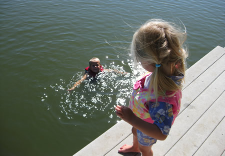 Crazy Water Boy Molly contemplates the ridiculousness of jumping off the dock.
